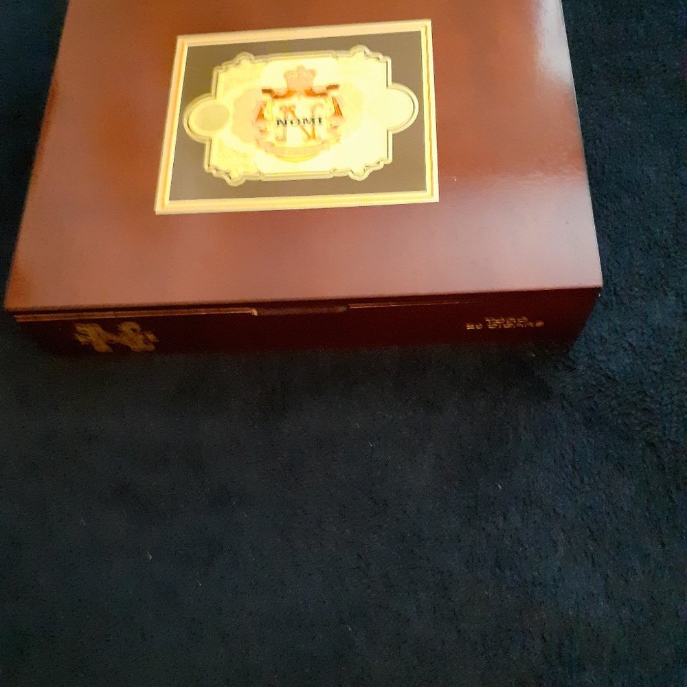 Nomi lacquered wood empty cigar box.